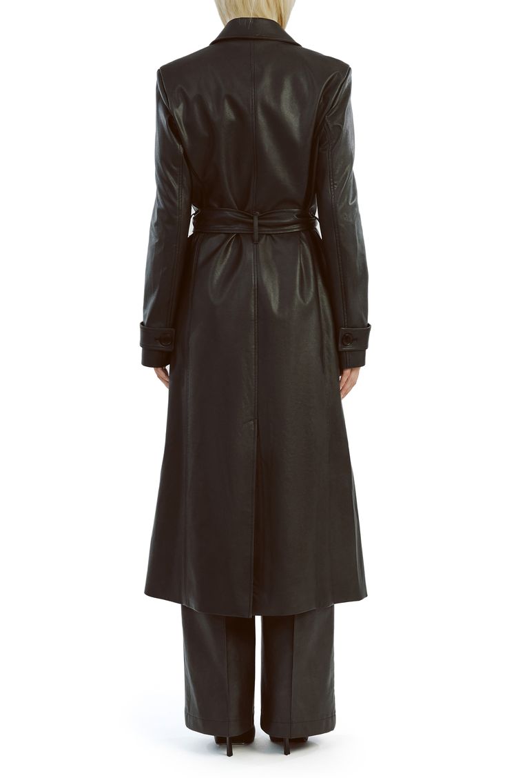 Update your outerwear portfolio with this sleek faux-leather trench coat featuring a classic notched collar and a matching tie belt. 48" length (size Small) Front button closure Notched collar Front welt pockets Removable tie belt Back vent Lined 55% polyester, 45% cotton with polyurethane coating Hand wash, line dry Imported Black Leather Outerwear With Belted Cuffs, Leather Outerwear With Belted Cuffs For Business, Business Leather Outerwear With Belted Cuffs, Belted Leather Jacket For Formal Occasions, Belted Faux Leather Long Coat, Belted Long Faux Leather Coat, Sleek Leather Belted Outerwear, Chic Leather Jacket With Belted Cuffs, Fitted Faux Leather Belted Outerwear