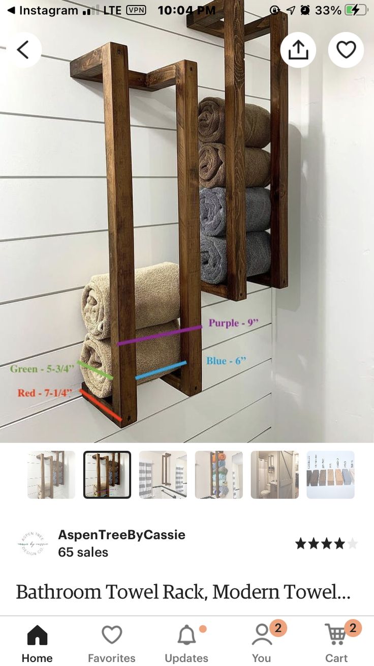 the bathroom towel rack is made out of wood