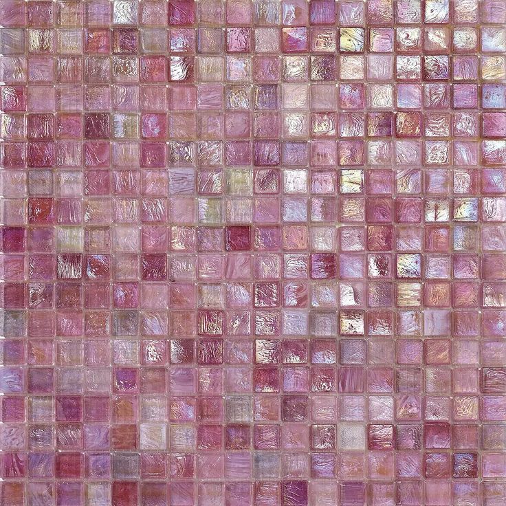 a close up view of pink glass tiles