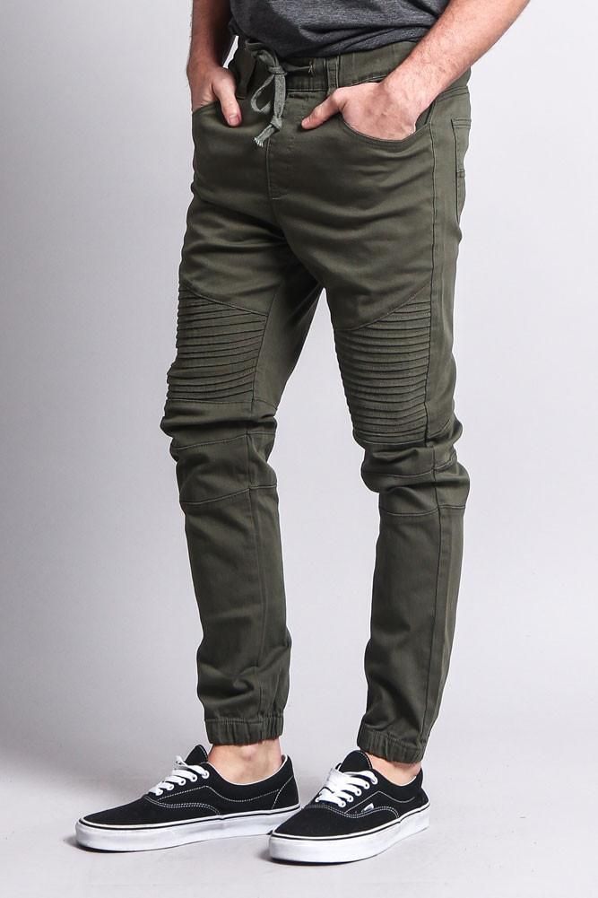 Urban Joggers With Ribbed Waistband, Urban Joggers For Spring, Spring Streetwear Fitted Joggers, Urban Stretch Jogging Pants, Urban Stretch Pants For Jogging, Urban Stretch Cotton Joggers, Trendy Stretch Tapered Leg Joggers, Urban Joggers With Elastic Waistband For Spring, Urban Style Spring Joggers With Elastic Waistband