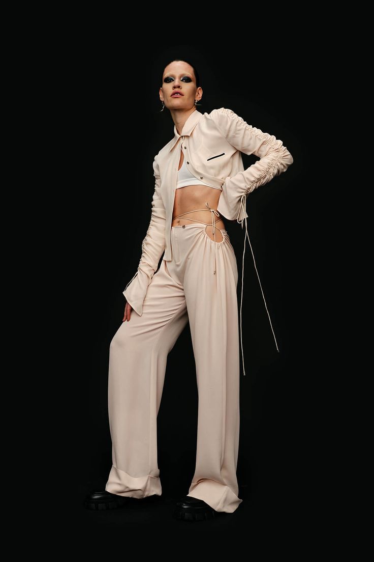 Loose-fit straight-leg trouser, Invisible button and zipper closure to the front. Circular gathering and cut-out on both side of the hip, adjustable with straps. Strappy waistband functional for double-securing the pant, detachable with chain-shaped buttons. Can be worn as a low-rise pant without the detachable waistband. Can be worn as a mid-rise pant with the detachable waistband. Folded cuff design at bottom ham. Two side-pockets with invisible zipper closure. low-rise. Zip-fly with Silver-to Cutout Pants, Low Rise Pants, Shopping Day, Invisible Zipper, Straight Leg Trousers, Natural Silk, Body Colour, Timeless Pieces, Two Piece Pant Set