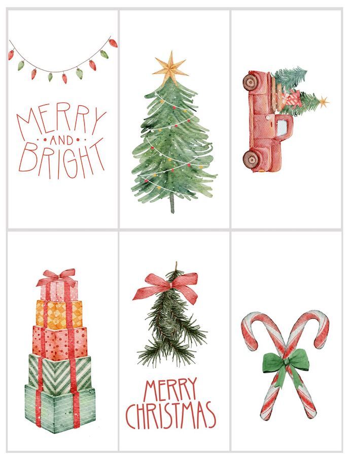 four christmas cards with watercolor designs on them, each featuring a tree and presents