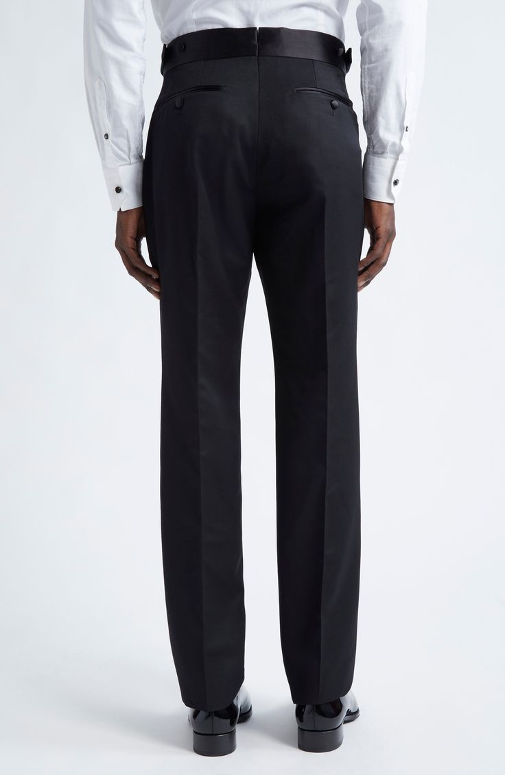 A sleek satin waistband and side stripes contrast with the rich wool-and-mohair body of these tuxedo-styled trousers masterfully crafted in Italy. Zip fly with side buckle closure Front slant pockets; back button-welt pockets 85% wool, 15% mohair with 100% cupro and 100% cotton contrasts Dry clean Made in Italy Designer Clothing Black Tuxedo Style Dress Pants For Formal Occasions, Tailored Black Dress Pants For Black-tie Events, Tailored Black Pants For Black-tie Events, Luxury Business Pants In Suiting Fabric, Luxury Tailored Dress Pants For Evening, Tailored Black Tuxedo Bottoms, Black Tailored Tuxedo Bottoms, Black Tuxedo Style Semi-formal Bottoms, Formal Tuxedo Pants Slim Fit