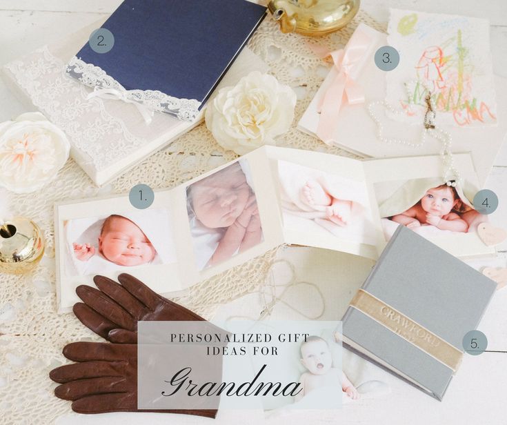 a table topped with pictures and gloves on top of a doily next to an open book