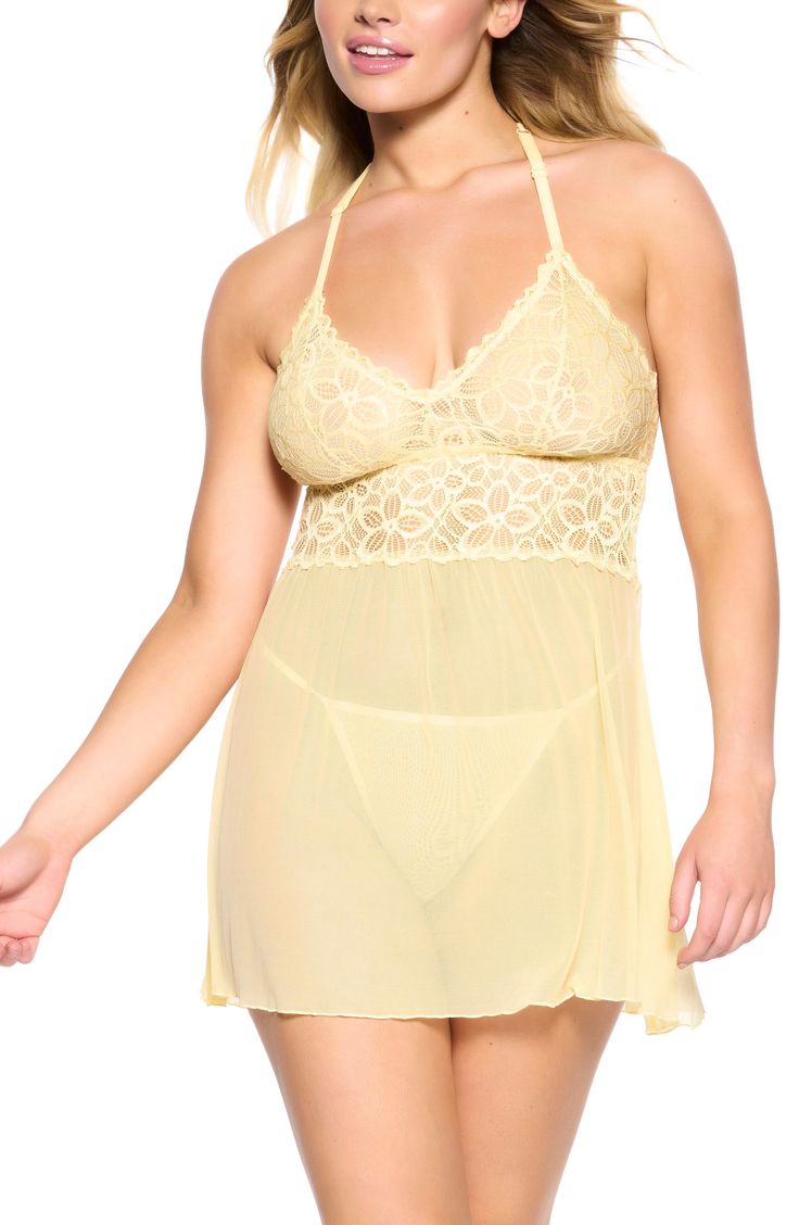 Romantic with a modern playful touch, this racerback chemise pairs soft, seductive mesh with cute and unlined daisy lace. G-string panties included 54" length V-neck Adjustable straps Unlined 90% nylon, 10% spandex Machine wash, tumble dry Imported Lingerie Coquette Chemise With Spaghetti Straps And Built-in Bra, Delicate Strap Camisole For Bedtime, Adjustable Straps Camisole For Bedtime, Coquette Spaghetti Strap Camisole For Bedtime, Coquette Camisole With Spaghetti Straps For Bedtime, Coquette Camisole For Sleep, Flirty Lace Sleepwear With Spaghetti Straps, Coquette Chemise With Built-in Bra And Spaghetti Straps, Flirty Lace Sleepwear With Built-in Bra