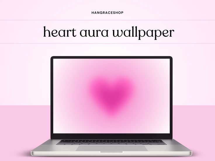 an open laptop computer sitting on top of a pink background with the words heart aura wallpaper