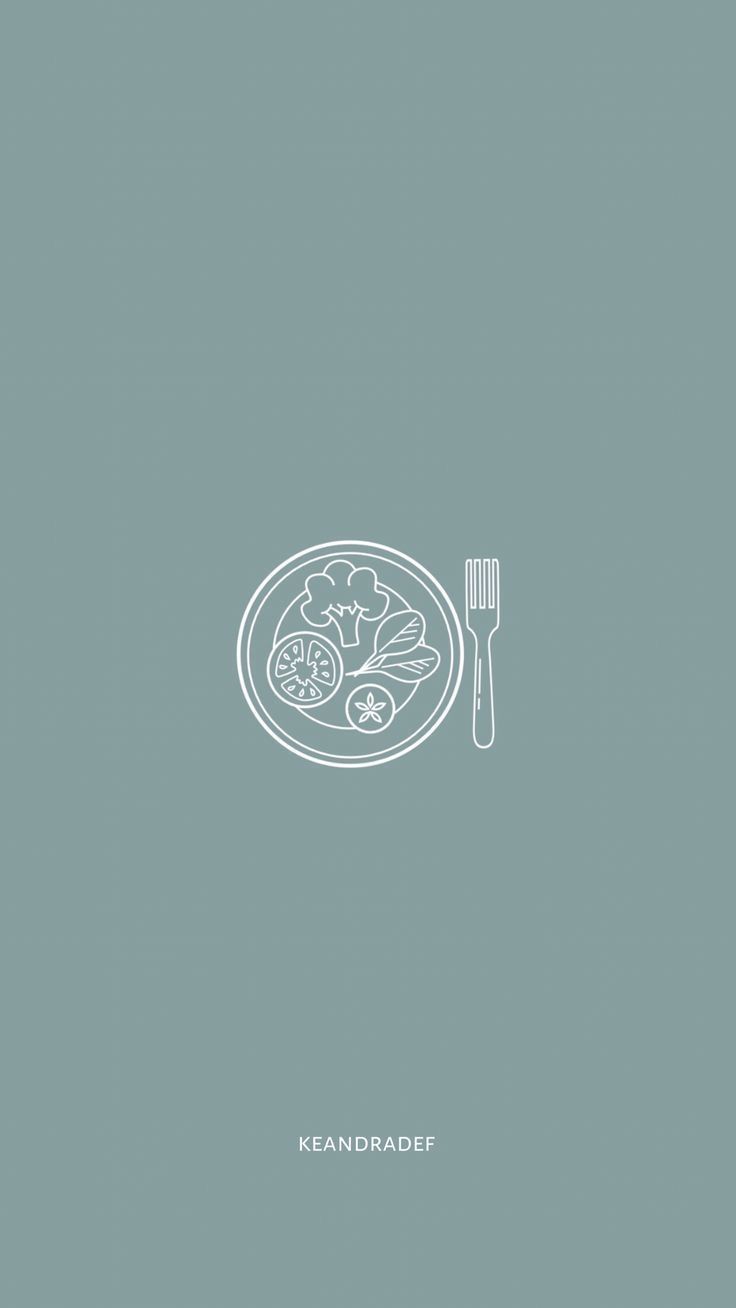 a plate of food with a fork and knife next to it on a green background