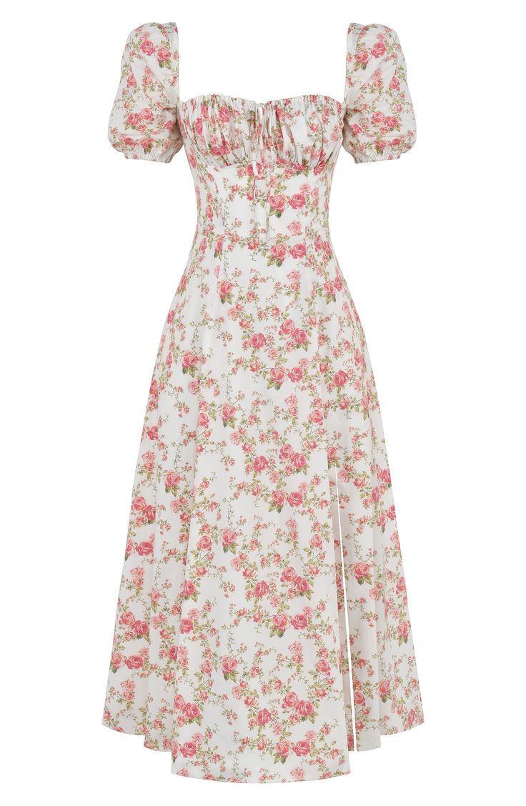 Channel major garden-party energy in this crisp floral sundress featuring a ruched neck, a built-in corset and dainty puff sleeves. Exclusive retailer Square neck Short sleeves Lined 65% cotton, 32% nylon, 3% elastane Dry clean Imported Fitted Sundress With Rose Print, Fitted Floral Sundress With Rose Print, Fitted Rose Print Floral Sundress, Fitted Floral Rose Print Sundress, Fitted Ruched Floral Sundress, Floral Dress With Smocked Bodice For Spring Garden Party, Spring Floral Dress With Smocked Bodice For Garden Party, Fitted Floral Dress With Ruched Square Neck, Fitted Floral Dress With Square Neck And Ruched Detail