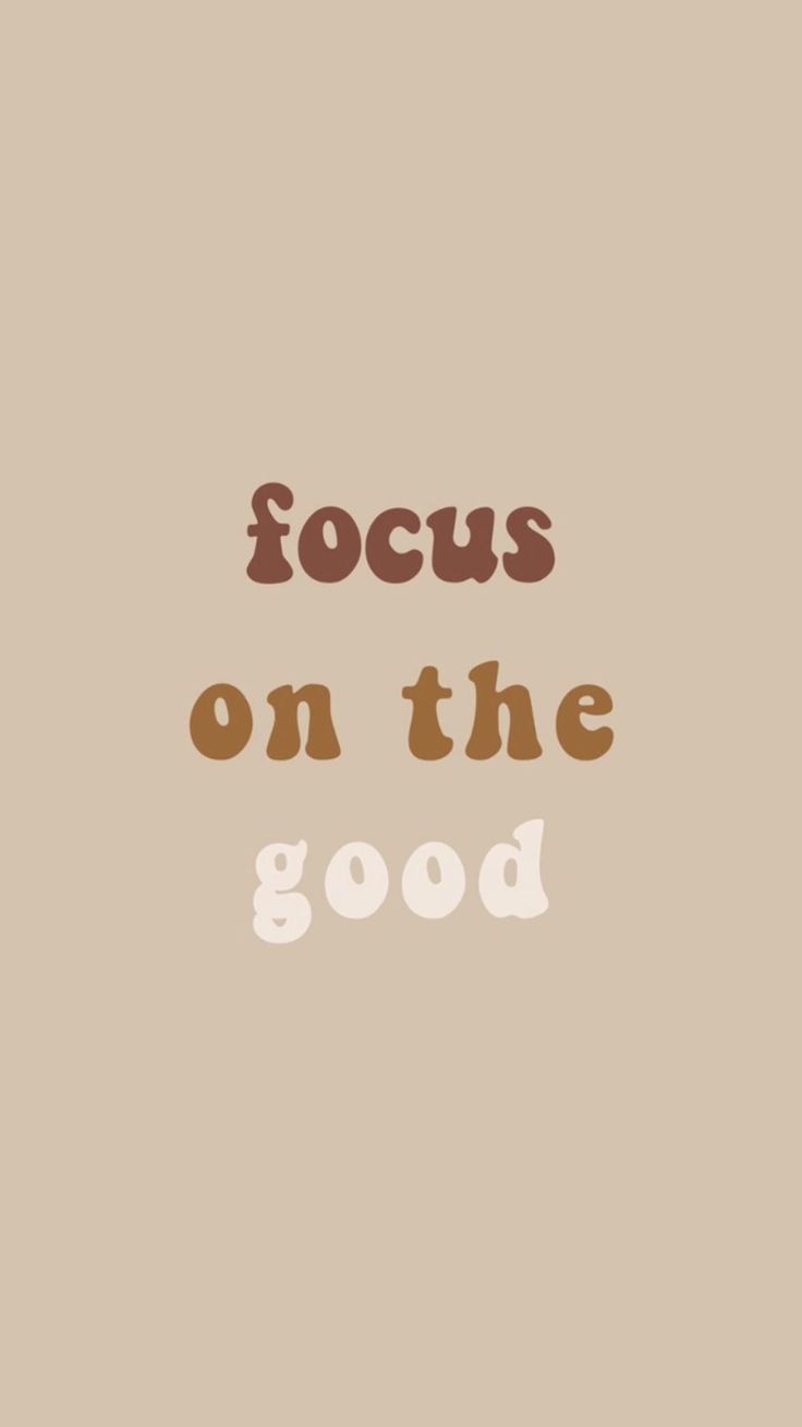 the words focus on the good are in brown and white