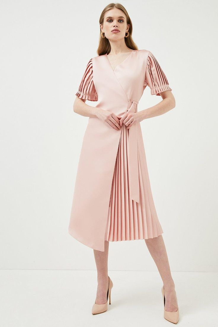 Give In To The Touchable Texture Of This Softly Hued Wrap Dress For Spring. It Blends Sharply Pressed Pleats With Romantic Puffed Sleeves, Sumptuous Blush-Pink Satin And A Waist-Defining Belt To Flatter Your Frame. Slip It On To Add An Effortlessly Put-Together Feel To Any Occasion. Elegant Pink Belted Midi Dress, Pink Formal Dress With Pleated Waist, Elegant Spring Belted Pleated Dress, Elegant Spring Pleated Dress With Folds, Belted Pleated Dress For Spring Formal, Feminine Pink Belted Midi Dress, Pink Pleated Waist Midi Dress For Evening, Pink Midi Dress With Pleated Waist For Evening, Formal Spring Midi Dress With Folds