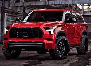 a red truck is parked in an industrial area