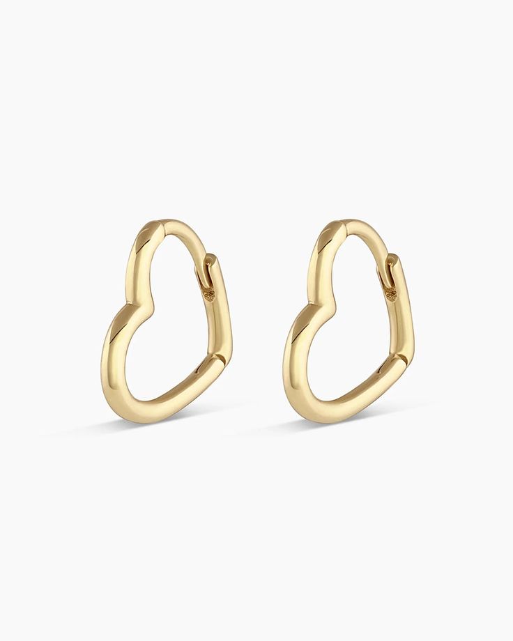 Gold | gorjana jewelry | 14k Gold Mini Open Heart Huggies Minimalist Huggie Heart Earrings For Anniversary, 14k Gold Huggie Earrings For Valentine's Day, Gold Huggie Earrings For Valentine's Day, Valentine's Day 14k Gold Huggie Earrings, Valentine's Day Tarnish Resistant Huggie Earrings, Yellow Gold Small Hoop Huggie Earrings For Valentine's Day, Yellow Gold Huggie Earrings For Valentine's Day, Dainty Yellow Gold Huggie Earrings With Heart Charm, Valentine's Day Yellow Gold Small Hoop Huggie Earrings