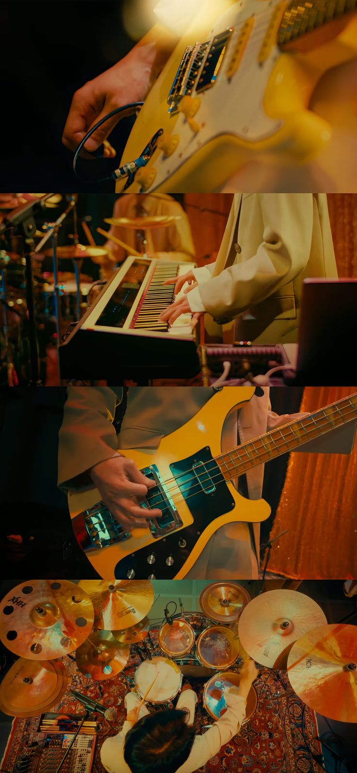 an image of a man playing guitar with his laptop and other musical instruments in the background