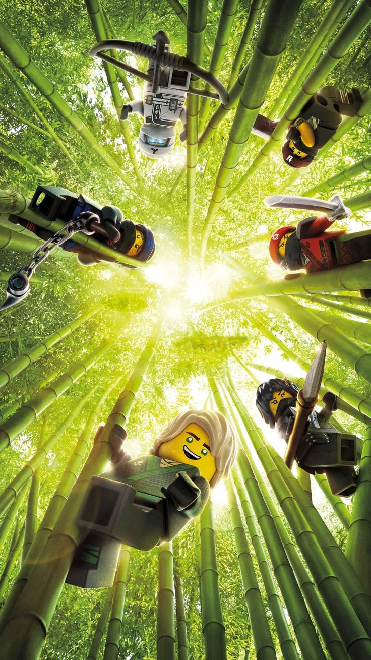 the lego movie poster is shown with many people standing in front of bamboo trees and looking up