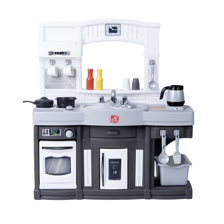 a toy kitchen with sink, oven and microwave