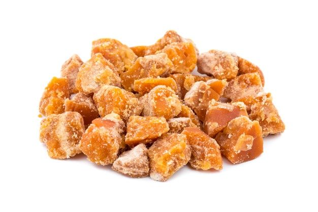 a pile of sugared candies on a white background