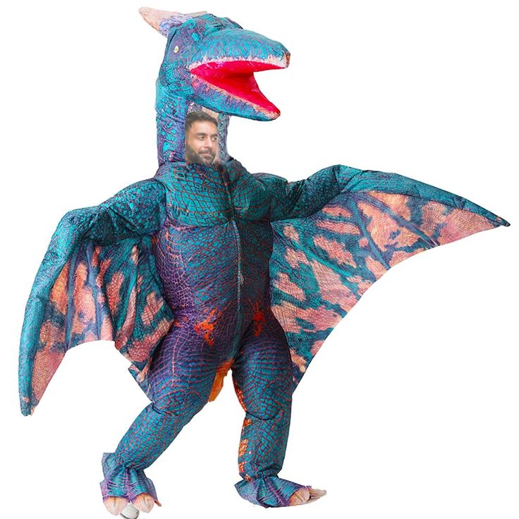 a man in a blue and orange dragon costume