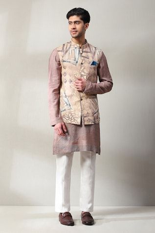 Dusky pink sleeveless bundi with geometric, floral print and aari embroidery. Paired with kurta and pant. - Aza Fashions Designer Sleeveless Kurta For Spring, Fitted Sleeveless Kurta For Spring, Spring Fitted Sleeveless Kurta, Spring Sleeveless Fitted Nehru Jacket, Fitted Pink Nehru Jacket With Floral Embroidery, Fitted Festive Vest For Spring, Spring Designer Nehru Jacket, Fitted Sleeveless Nehru Jacket For Transitional Seasons, Spring Sleeveless Nehru Jacket With Chikankari Embroidery