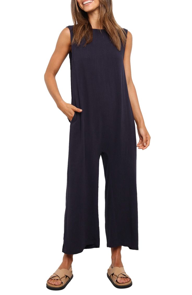 A back cutout adds to the breezy design of this linen-kissed jumpsuit fashioned with roomy legs. Pull-on style Bateau neck Sleeveless Side-seam pockets 70% rayon, 30% linen Hand wash, dry flat Imported Wide Leg Jumpsuits And Rompers With Pockets For Vacation, Relaxed Fit Sleeveless Jumpsuits For Loungewear, Sleeveless Jumpsuits And Rompers With Side Pockets For Loungewear, Casual Sleeveless Jumpsuits With Side Pockets, Casual Sleeveless Jumpsuits And Rompers With Pockets, Casual Sleeveless Jumpsuits With Slip Pockets, Beach Wide-leg Jumpsuits And Rompers With Pockets, Sleeveless Summer Jumpsuits And Rompers With Relaxed Fit, Beach Wide Leg Jumpsuits And Rompers With Pockets