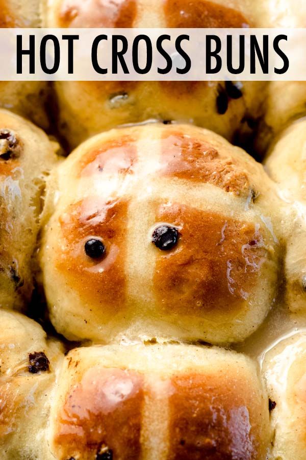 hot cross buns with raisins and butter on top