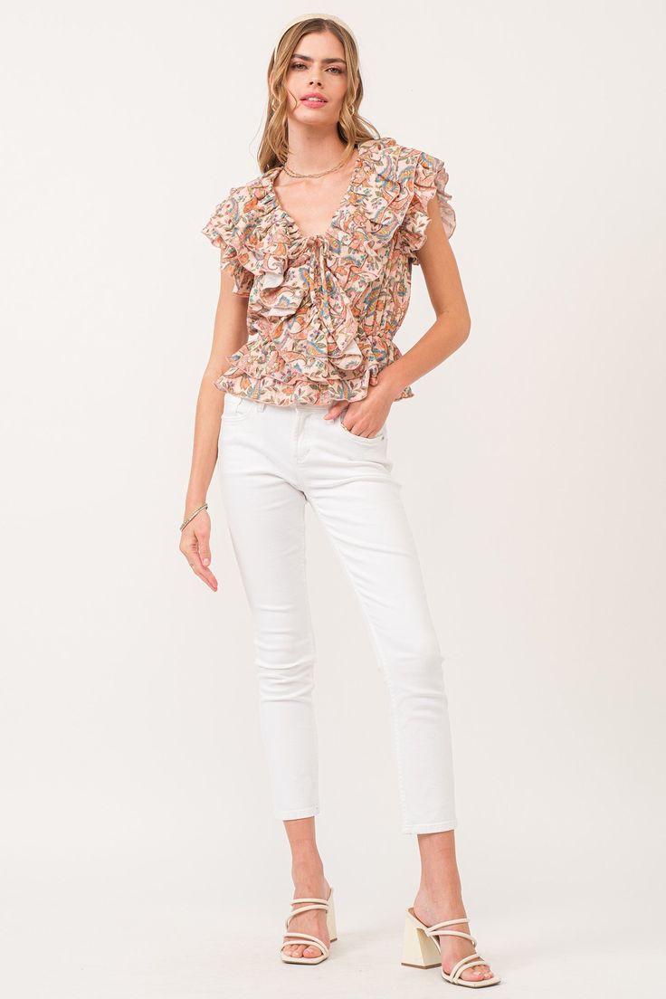 Multi ruffle top, v-neck front with spaghetti self neck ties & elastic waist. Multi print woven on standard fit. Gracing a soiree & strolling through sun-kissed day, whispers of sophistication & ever desired...Body length from HPS: 22", Armhole ruffle: 5 1/2", Bust: 39" (Size Small) 100% COTTON Machine wash cold, Tumble dry low Imported Desired Body, Kiss Day, Neck Ties, Ruffle Top, Sun Kissed, Neck Tie, Elastic Waist, Paisley, Spaghetti