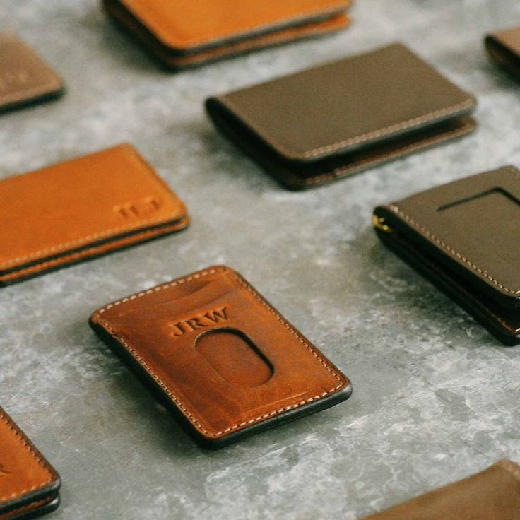 Our handmade men’s money clip is the perfect solution for those who want a simple wallet that isn’t too bulky, but is robust enough to hold everything you need— cash included. Featuring two front pockets with integrated thumb slot, a hidden rear pocket for those “always need but rarely use” insurance cards and the like, and the strongest magnets we were able to fit into a wallet of this size. Handcrafted to complement a guy of any age. Premium Horween full-grain leather and robust stitching for Classic Trifold Wallet With Cell Phone Pocket For Everyday, Trifold Card Holder With Rfid Blocking For Everyday, Rfid Blocking Trifold Card Holder For Everyday Use, Everyday Trifold Rfid Blocking Card Holder, Rfid Blocking Rectangular Trifold Wallet, Everyday Rectangular Wallet With Rfid Blocking, Modern Wallets With Cell Phone Pocket For Everyday Use, Rectangular Rfid Blocking Wallets For Everyday Use, Everyday Trifold Wallet With Hidden Phone Sleeve