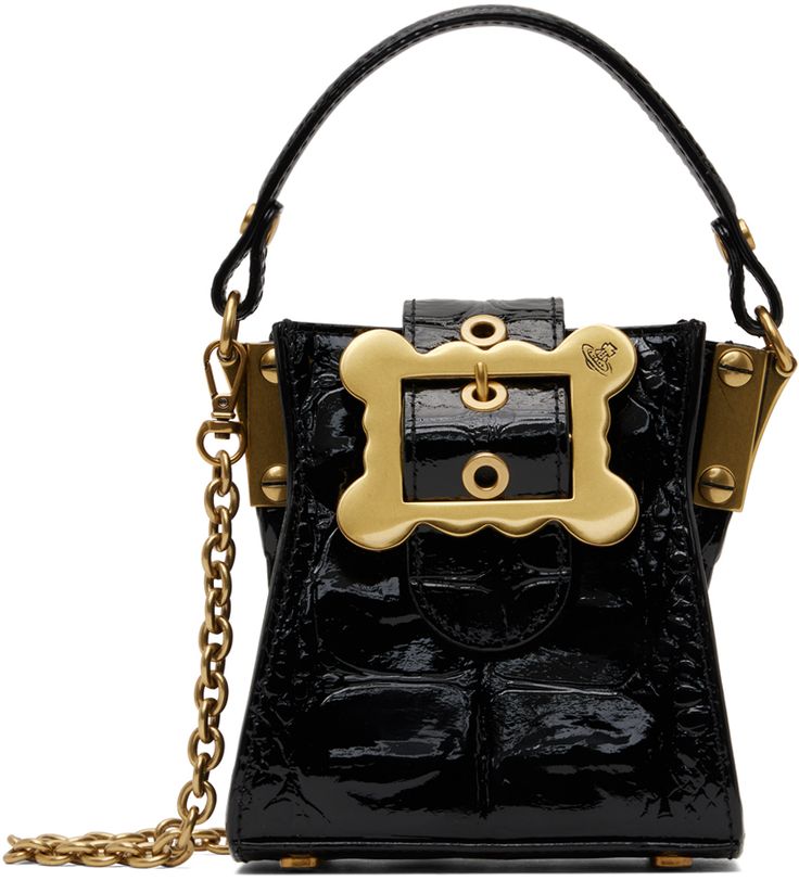 Croc-embossed top handle bag in black. · Fixed carry handle · Detachable curb chain crossbody strap · Bumper studs at base · Magnetic pin-buckle tab at open throat · Moire lining · Logo-engraved antiqued gold-tone hardware · H5 x W4.75 x D3 Supplier color: Black Luxury Satchel Bag With Hardware, Designer Rectangular Bag With Hardware, Luxury Crossbody Bag With Hardware, Vivienne Westwood Bags, The Vivienne, Everyday Accessories, Black Shoulder Bag, Handle Bag, Curb Chain