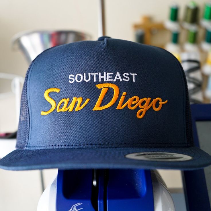 Southeast San Diego, Padres Embroidered Trucker Hat I Embroider All The Products On My Page Myself So My Items Are Priced Accordingly. I Use Quality Yupoong Classic Snapbacks For My Hats. The Size Is An Adjustable Snapback From From 6 5/8" To 7 5/8". Thanks For Looking!! Navy Embroidered Baseball Cap, Navy Embroidered Cap, Blue Trucker Hat With Embroidered Logo And Flat Bill, Adjustable Navy Embroidered Hat, Casual Blue Embroidered Trucker Hat, Blue Embroidered Adjustable Trucker Hat, Adjustable Orange Hat With Embroidered Logo, Orange Adjustable Hat With Embroidered Logo, Handcrafted Accessories