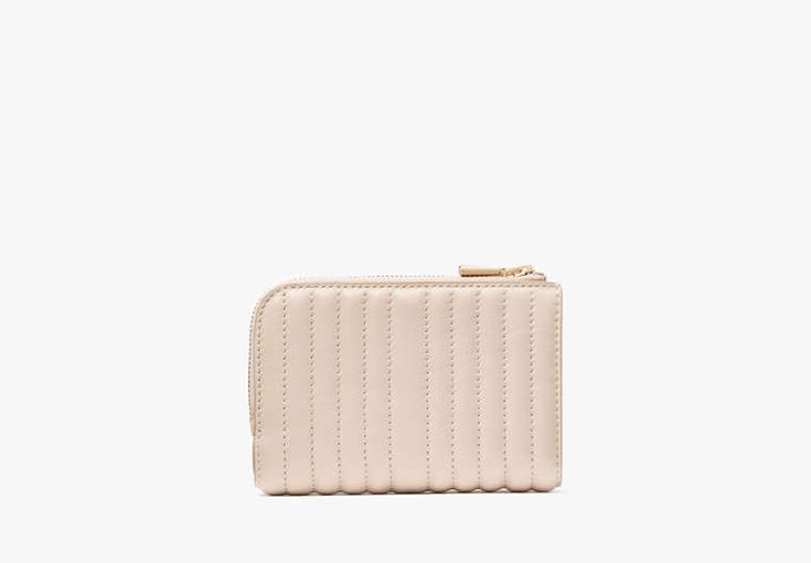 Perennially chic with luxe finishing touches our Deco collection features elevated staples for both everyday and special occasions. This compact wallet is made from smooth quilted leather with our new K hardware inspired by Art Deco style. | Kate Spade Deco Quilted Compact Wallet, Milk White Elegant Quilted Clutch For Formal Occasions, Elegant Quilted Rectangular Wallet, Elegant Quilted Wallet For Formal Occasions, Elegant Quilted Wallets For Formal Occasions, Elegant Quilted Leather Wallet, Luxury Kate Spade Wallets With Card Slots, Classic Quilted Wallet For Everyday Use, Classic Quilted Wallet, Elegant Beige Coin Purse With Zipper Closure