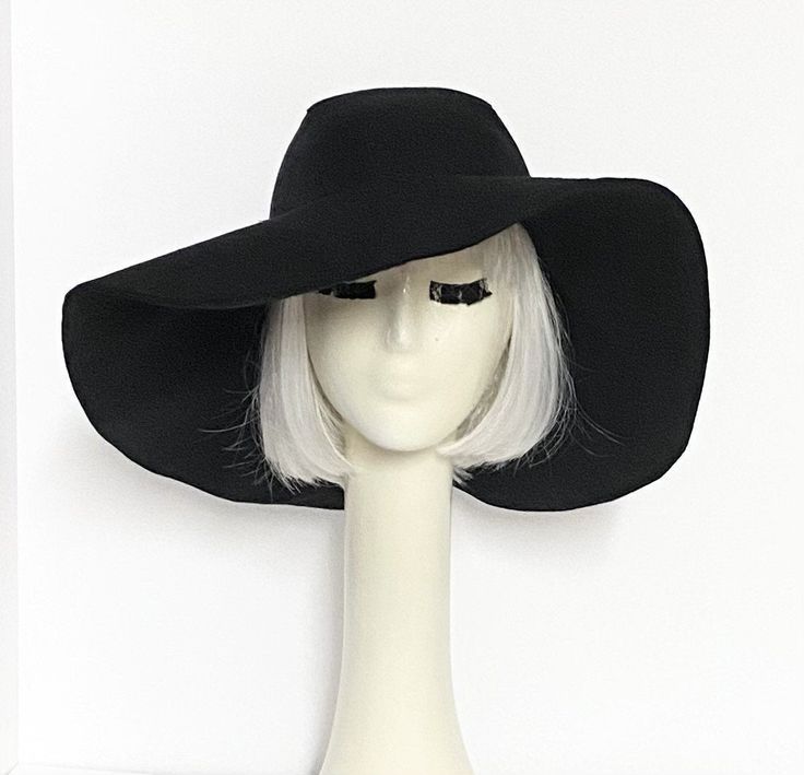 "Wide Brim sun hat made with black linen , lined in rayon print, the hat has a 2 section crown 3 1/2 \" in length and a one piece 5\" brim, a cotton band inside. One size fits most up to 23\" Machine wash cold / hand dry Made in USA Press if needed / packable" Wide Brim Sun Hat For Winter Vacation, Outdoor Wide Brim Hat One Size, Wide Brim Outdoor Hat One Size, Wide Brim Hats For Outdoor, Vacation Wide Brim Sun Hat, Black Bucket Hat For Spring Travel, Lightweight Black Bucket Hat With Curved Brim, Black Lightweight Bucket Hat With Curved Brim, Black Curved Brim Hat With Uv Protection