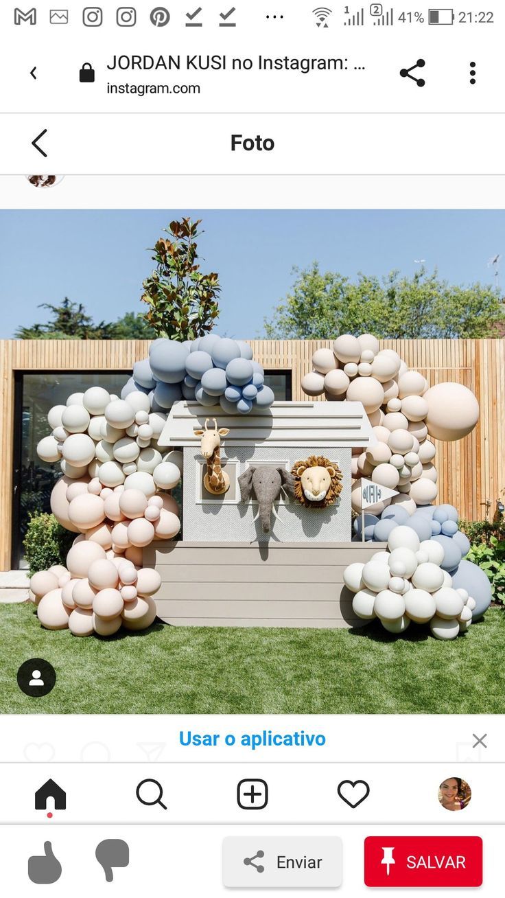 an instagram page with balloons in the shape of a house and a man sitting on a bench