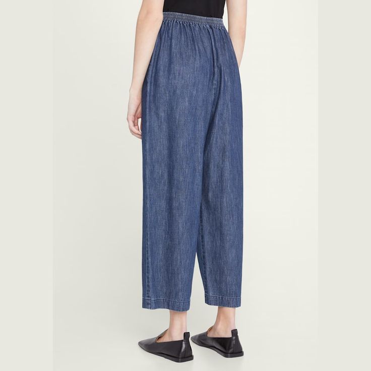 Eskandar Japanese trousers in denim Mid rise sits high on hip Elasticized waistband Side slip pockets Straight legs Cropped length Pull-on style Cotton Dry clean Made in Poland High Waist Relaxed Fit Pull-on Jeans, High Waist Pull-on Pants For Elevated Casual, Denim Blue Straight Leg Bottoms With Pull-on Style, Wide Leg Dark Wash Bottoms With Welt Pockets, Dark Wash Wide Leg Bottoms With Welt Pockets, High Waist Bottoms For Elevated Casual, Elevated Casual High Waist Pull-on Bottoms, High Waist Pull-on Style Bottoms For Smart Casual, High Waist Pull-on Bottoms For Elevated Casual