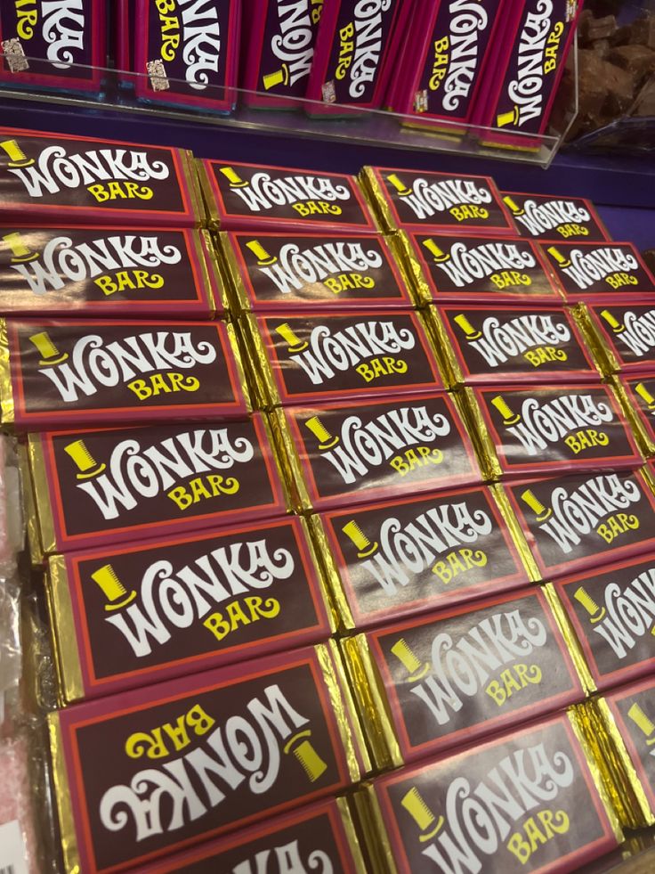 rows of wonka's bars stacked on top of each other