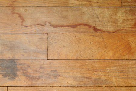 an image of wood flooring with stains on it