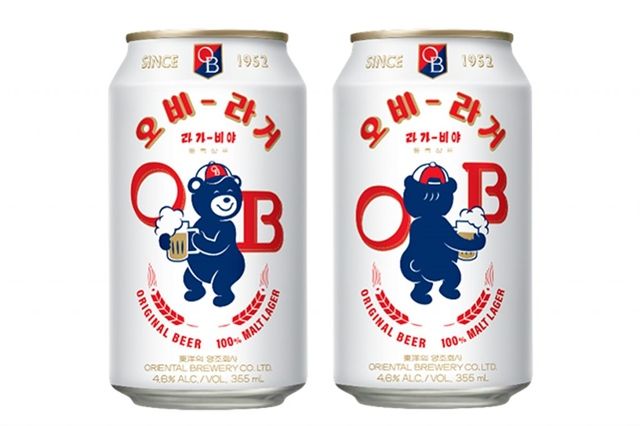 two cans of odb beer on a white background