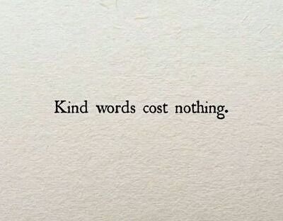 the words kind words cost nothing written on a piece of white paper with black ink