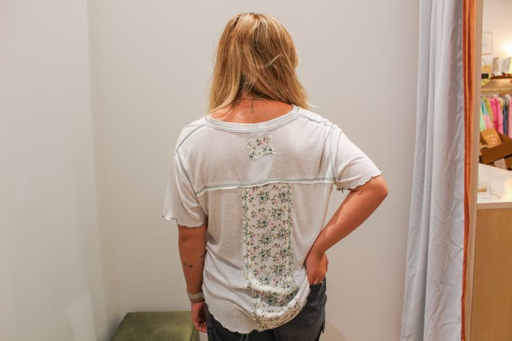 Introducing our Ivory Blossom Tee - perfect for a stylish, yet playful look. Made with soft and breathable fabric, this tee features a beautiful ivory blossom design that will add a touch of whimsy to any outfit. Perfect for any occasion, this tee is a must-have for the fashion-forward individual. Spring Floral Print Short Sleeve Crew Neck Top, Cream Floral Embroidered Summer Tops, Cream Graphic Print Top For Loungewear, Cream Cotton Top With Floral Embroidery, Floral Print Crew Neck Top For Loungewear, Everyday Spring Graphic Tee Short Sleeve Top, Casual Floral Print Tops For Loungewear, Everyday Graphic Tee Short Sleeve Top For Spring, Graphic Tee Short Sleeve Top For Spring