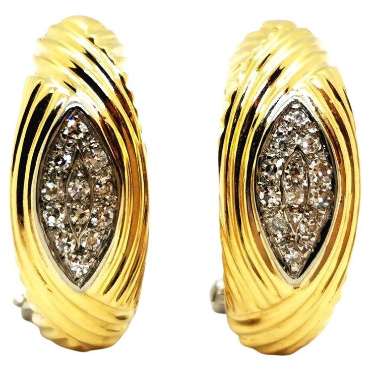 Pair of diamond earrings in 750 thousandths (18 carat) yellow gold. godronné pattern. each decorated in the center with a grain paving of 12 diamonds. about 0.008ct each. total number of diamonds: 24. total weight diamonds: about 0.192ct. dimensions: 2.09 cm X 0.83 cm. total weight: 9.49g. Owl hallmark. excellent condition. Classic Gold Diamond Clip-on Earrings, Classic Yellow Gold Diamond Earrings For Evening, Luxury Yellow Gold Diamond Earrings For Anniversary, Luxury Brilliant Cut Yellow Gold Diamond Earrings, Luxury Yellow Gold Brilliant Cut Diamond Earrings, Luxury Yellow Gold Diamond Earrings With Brilliant Cut, White Gold Diamond Clip-on Earrings With Diamond Accents, Yellow Gold Diamond Earrings With Cubic Zirconia, White Gold Clip-on Earrings With Diamond Accents