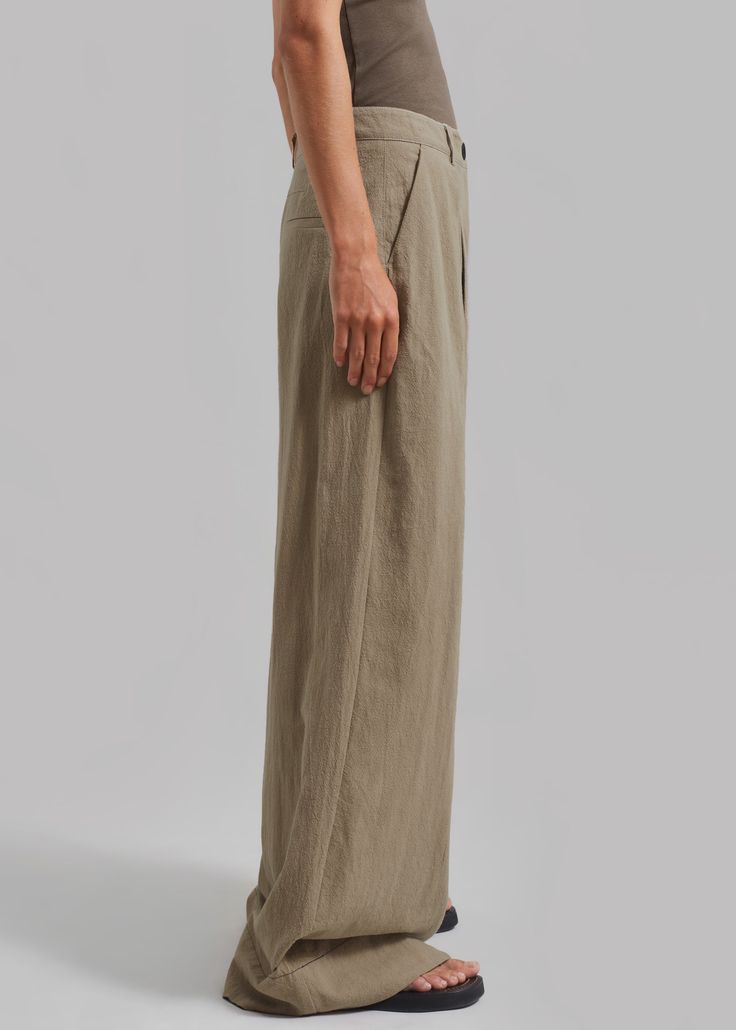 Color: Trench Midweight linen cotton blend Relaxed fit Wide leg High rise Pleated detailing Slant hip pockets Illusion welt back pockets Belt loops Zip fly Front button closure Unlined 55% Linen 45% Cotton Delicate Machine Wash By The Garment. Imported Ankara Pants, Pocket Belt, Ankara, Latest Fashion Trends, Wide Leg, High Rise, Shop Now, Cotton Blend, Relaxed Fit