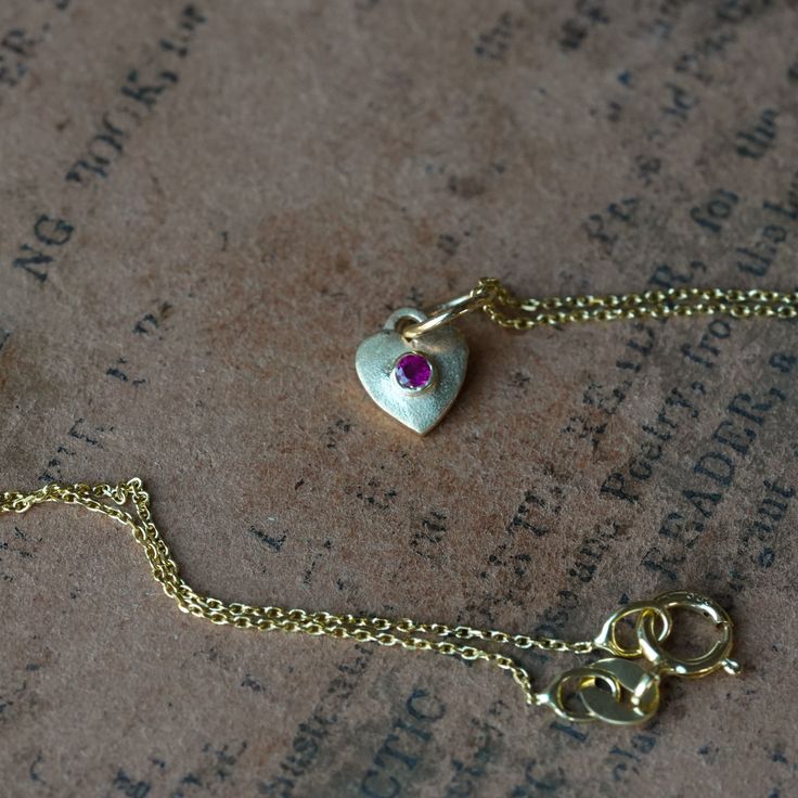 These itty bitty 14k yellow gold charms are the absolute sweetest! Each boasts either a ruby or blue sapphire.They measure 3/8" from the top of the jump ring to the bottom of the heart and are ideal for layering with other chains and charms, or wearing on their own. This listing is for the charm only. Chains can purchased in 16", 18" and 20" to complete the necklace. Perfect for everything from bridal jewelry to daily wear. Available to try on in our Boulder, Colorado jewelry store. Gold Charms, Boulder Colorado, Fine Jewelry Bracelets, Itty Bitty, Fine Jewelry Gift, Gold Charm, Jump Rings, Jewelry Store, Charm Earrings