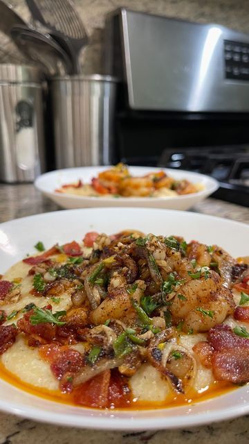 some food is sitting on a white plate in the middle of a kitchen counter top