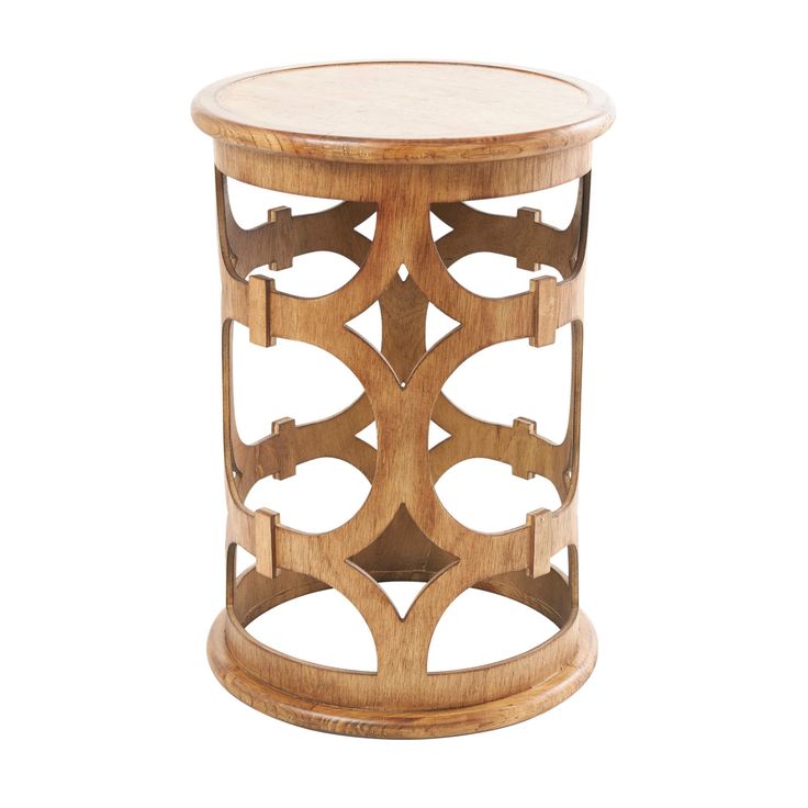 a wooden table with an intricate design on the top and bottom, against a white background