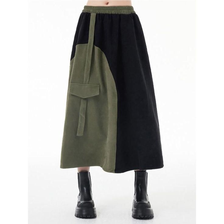 Discover Your New Favorite Skirt Step into the world of casual elegance with our Green & Black Asymmetric A-Line Skirt, a perfect blend of style and comfort for any season. Whether you're strolling through a spring garden or enjoying an autumn evening, this skirt's versatile design makes it an essential addition to your wardrobe. Product Features Size: One Size fits most, with a comfortable stretch from 26.8" to 44.9" at the waist. Length: Graceful mid-calf length at approximately 32.3 inches. M Autumn Evening, Cardigan Sweater Vest, Winter Layering, Patchwork Designs, Green Skirt, Spring Garden, Casual Elegance, Waist Length, Summer Tops