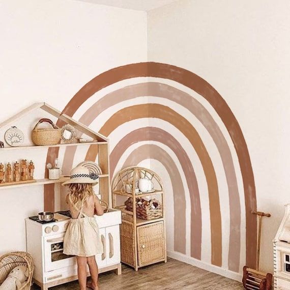 Slanted Walls Nursery, Rainbow Wall Accent, Boho Rainbow Playroom Ideas, Boho Rainbow Accent Wall, Baby Nursery Accent Wall, Boho Rainbow Mural, Boho Rainbow Nursery Girl, Rainbow Wall Art Diy, Boho Wallpaper Accent Wall