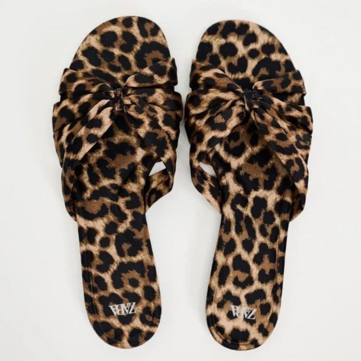 New With Tag Zara S/S 2024 Collection Flat Sandals With Animal Print Fabric. Front Knot Detail. Sole Height: 0.4 Inches (1 Cm) Leopard | 3622/310 Upper 100% Polyester Sole 100% Polyurethane Thermoplastic Insole 100% Polyester Clothing Care Guide: Do Not Wash Do Not Submerge In Water Do Not Use Bleach / Whitener Leather/Patent Leather/Glossy Finish Leather. Clean With A Dry Cotton Cloth. Do Notiron Suede/Nubuck/Split Leather. Clean With A Soft Brush Or Stiff Sponge. Do Not Dry Clean Leather. May Casual Leopard Print Sandals For Spring, Leopard Print Synthetic Sandals For The Beach, Leopard Print Synthetic Sandals For Beach, Leopard Print Round Toe Sandals For Vacation, Leopard Print Open Toe Sandals For Vacation, Summer Leopard Print Synthetic Sandals, Trendy Leopard Print Summer Sandals, Summer Sandals With Leopard Print And Flat Heel, Summer Leopard Print Sandals With Round Toe