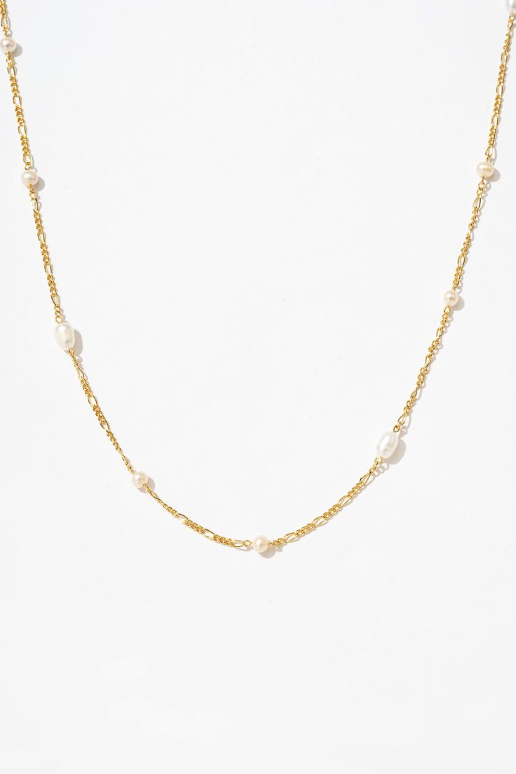 Adorn your neckline with a scattering of lustrous pearls, handcrafted with fine materials for timeless elegance and versatility. Formal Pearl Drop Chain Necklace, Long Pearl Drop Chain Necklace, Elegant Pearl Drop Chain Necklace, Elegant Pearl White Necklace With Beaded Chain, Elegant Pearl White Beaded Chain Necklace, Long Pearl Charm Necklace, Elegant Pearl Chain Necklace With Pearl Pendant, Formal Pearl Chain Necklace With Beaded Chain, Formal Pearl White Chain Necklace With Pearl Chain