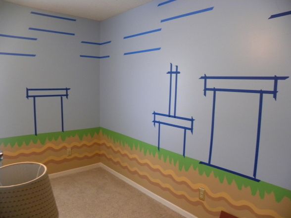 a room painted with blue and green lines