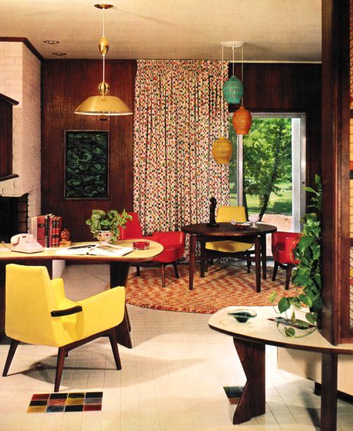 a living room filled with lots of furniture next to a fire place and window covered in curtains