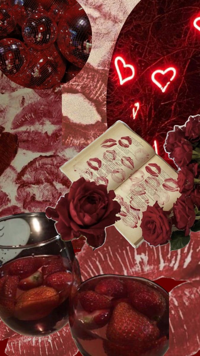 two glasses filled with strawberries on top of a table next to a heart shaped mirror