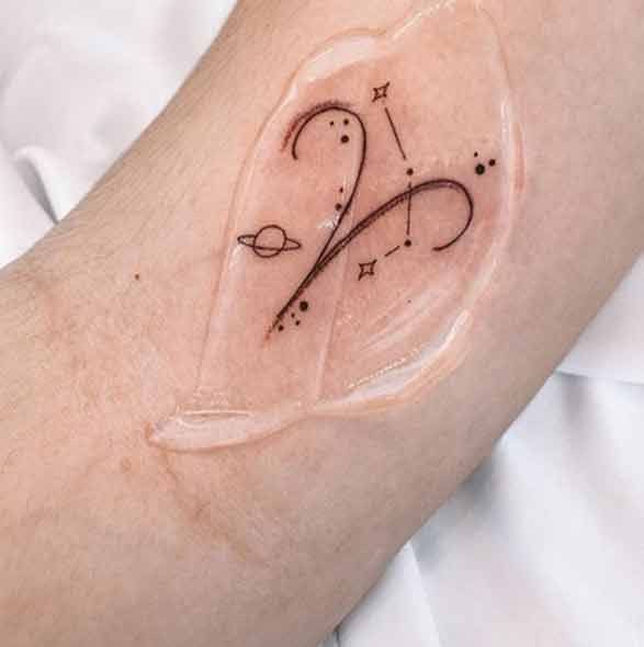 a person with a tattoo on their arm